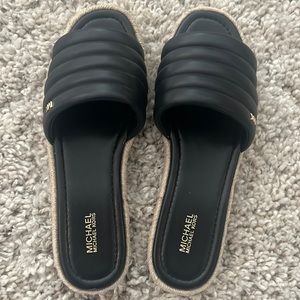 Michael Kors slide sandal.